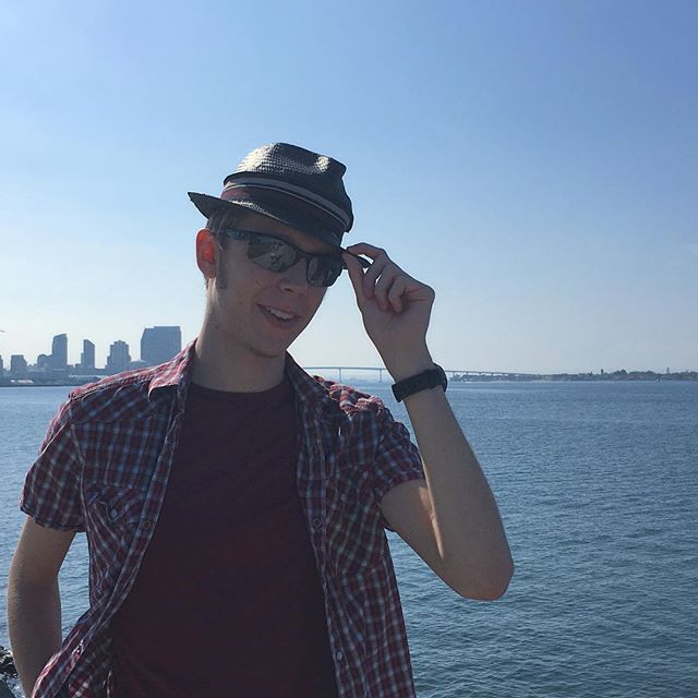Ben Tipping hat at the beach